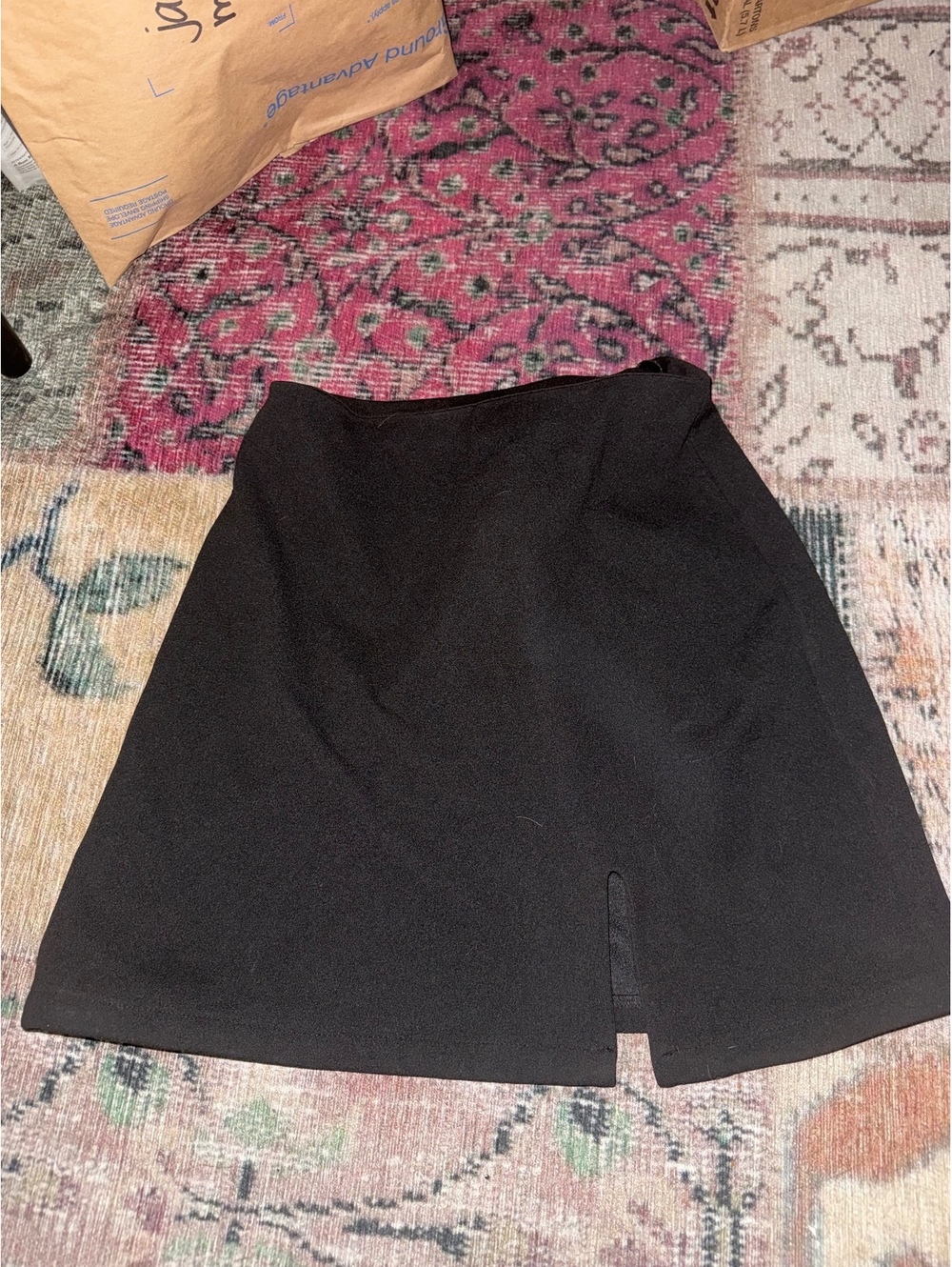 Short black miniskirt with a slit women’s